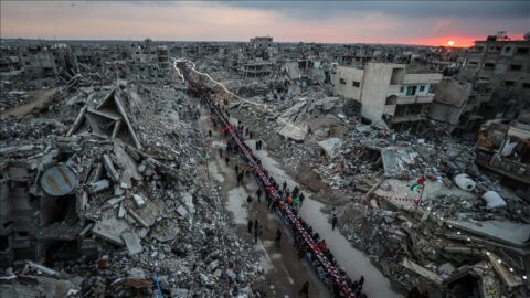 Palestinians break fast amidst the rubble in Gaza.